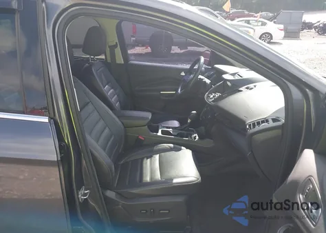 2017 Ford Escape Titanium z USA, uszkodzony, nr VIN 1FMCU0J90HUA19002